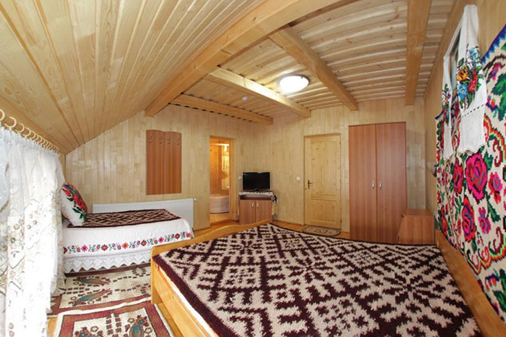 Pensiunea Sub Cetate La Matei Onceşti Cameră foto