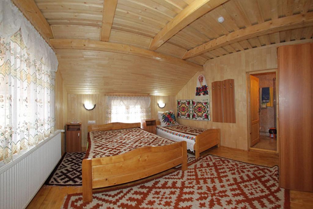 Pensiunea Sub Cetate La Matei Onceşti Cameră foto
